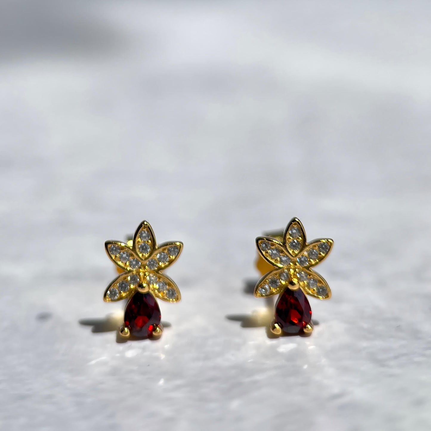 Petal Spark · Red Garnet Stud Earrings