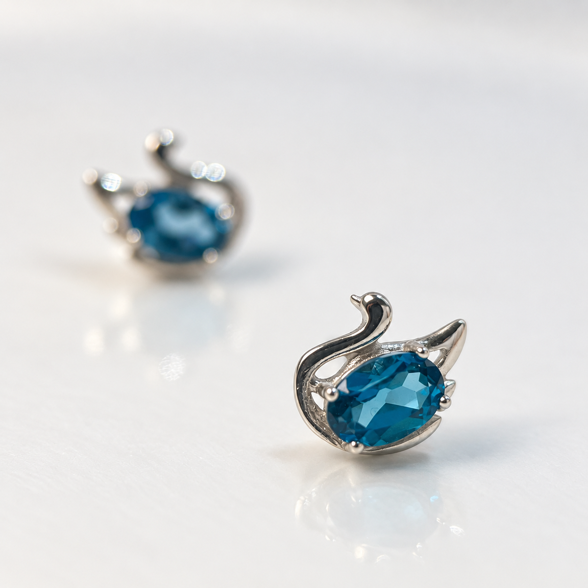 Blue Glide · London Blue Topaz Swan Stud Earrings