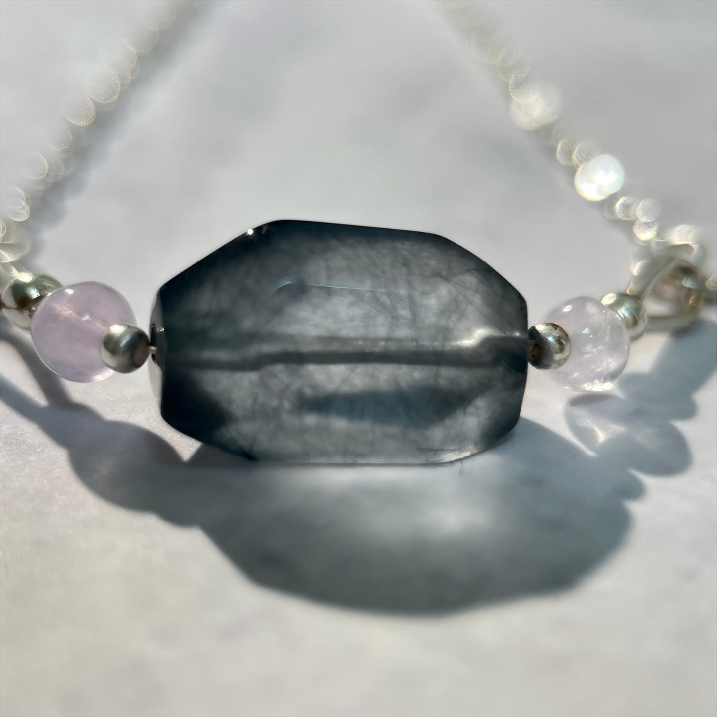 Deep Current · Rabbit Hair Quartz Pendant