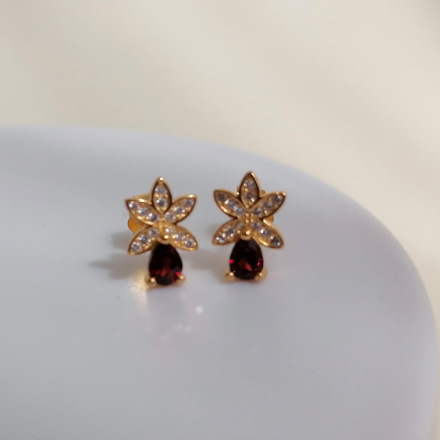 Petal Spark · Red Garnet Stud Earrings