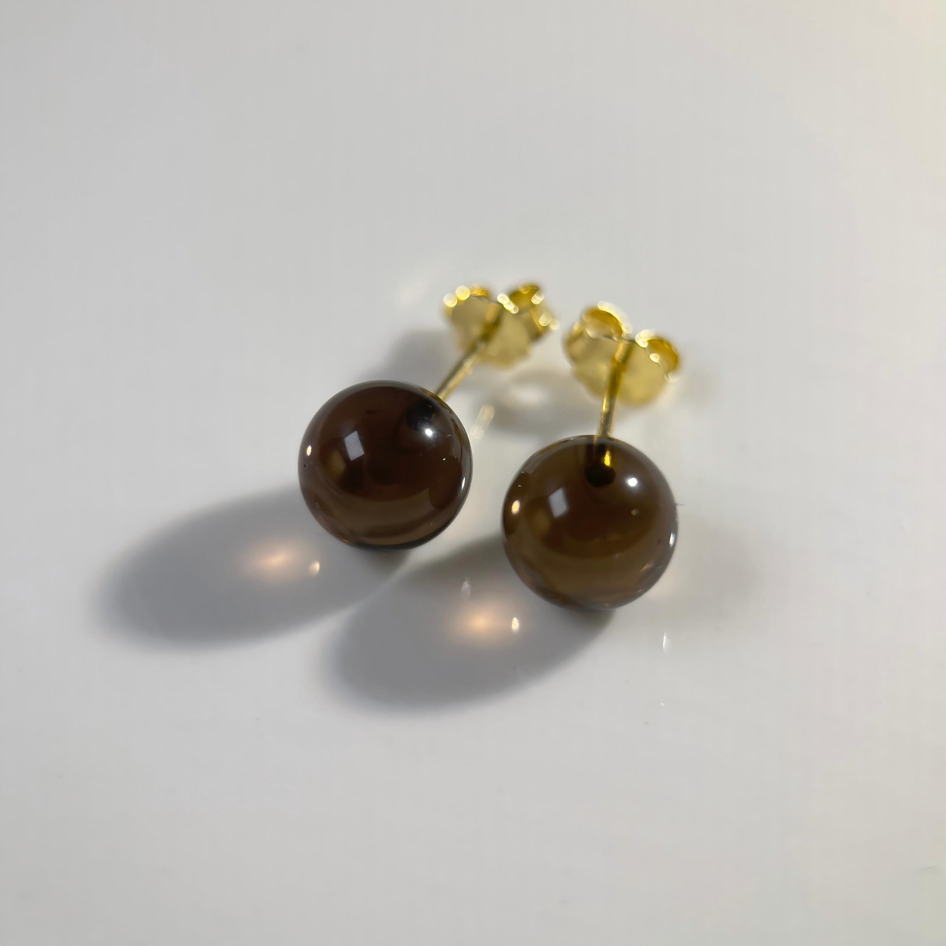 Warm Shade smoky quartz stud earrings in gold-plated sterling silver with warm brown quartz beads