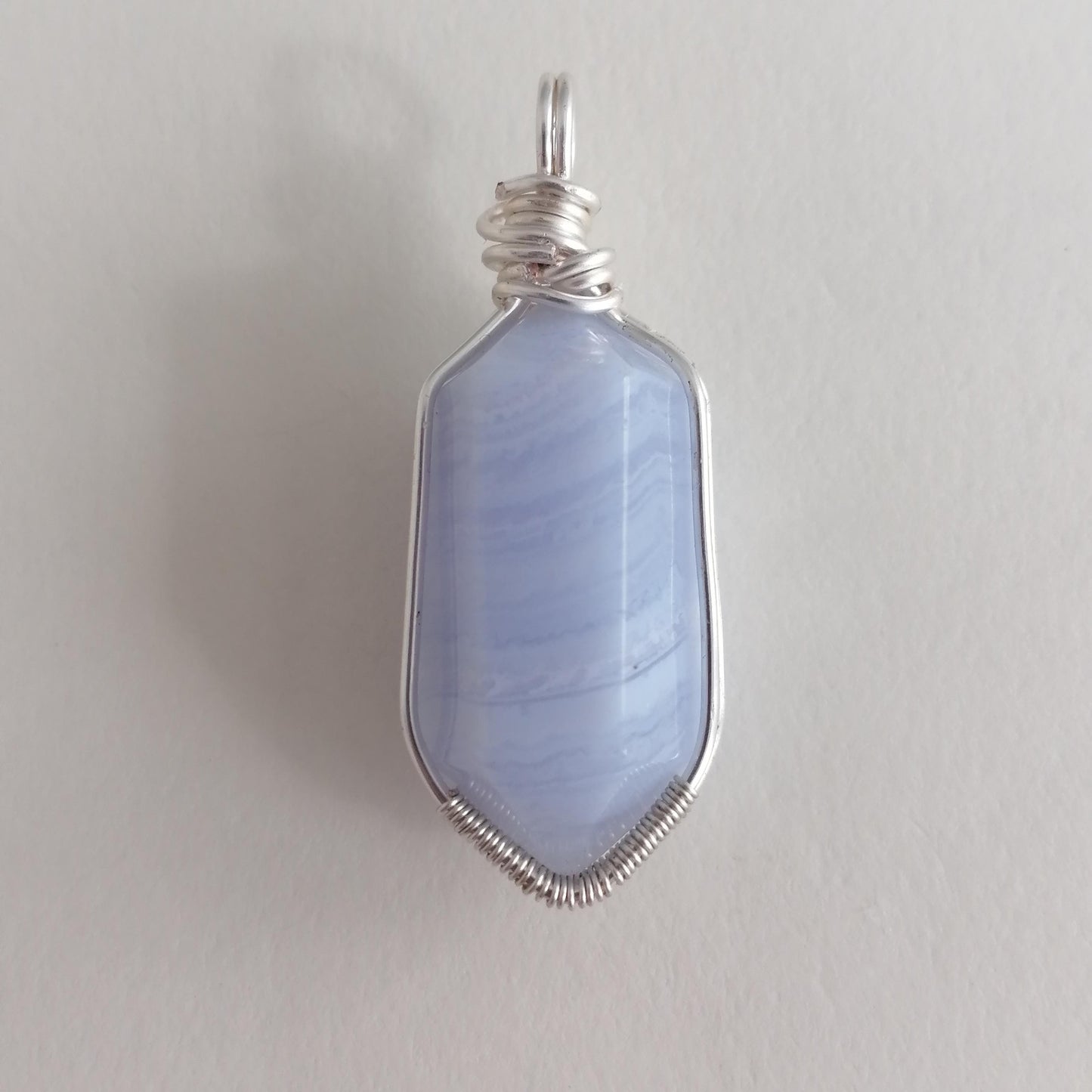Blue lace agate pendant in silver wire wrap
