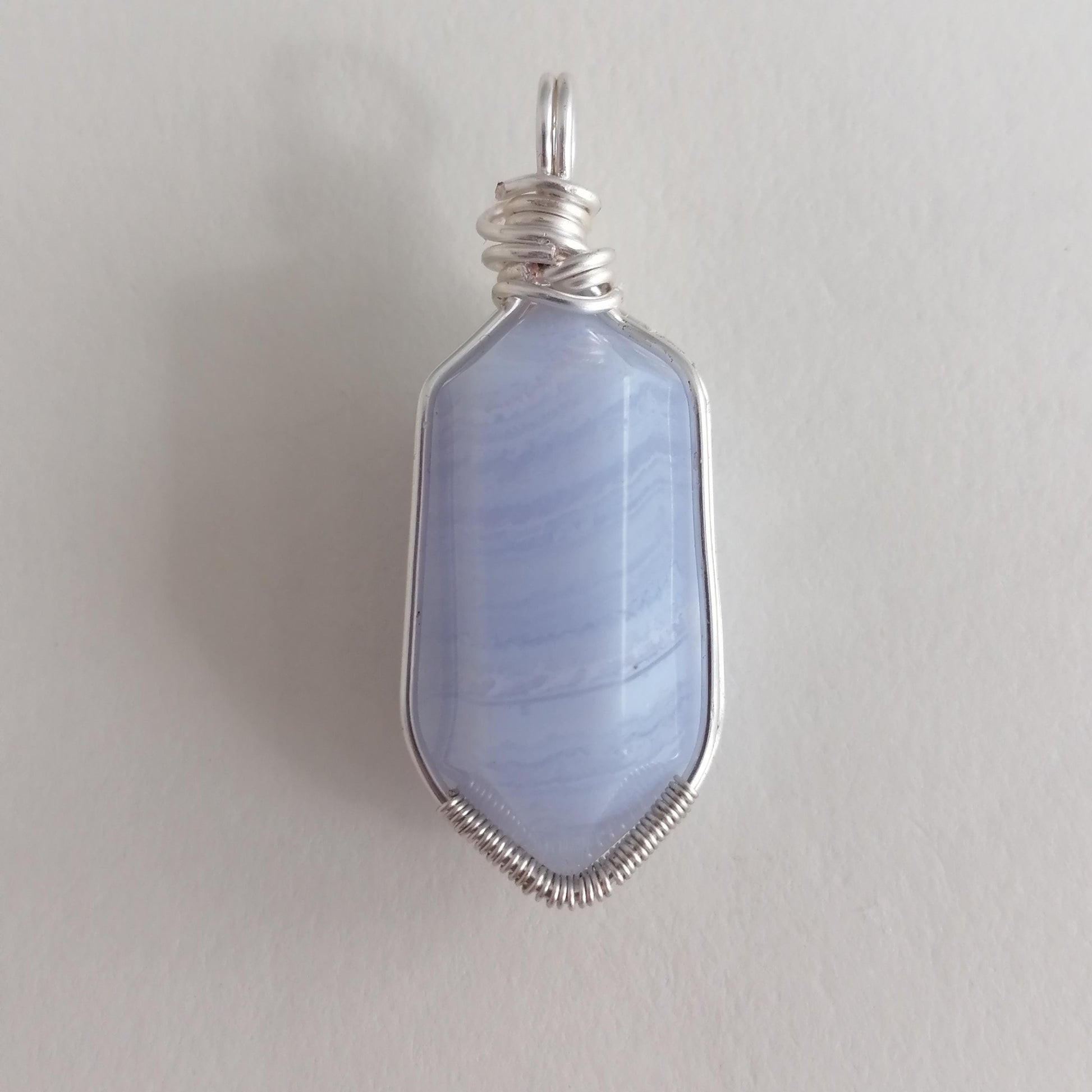 Blue lace agate pendant in silver wire wrap